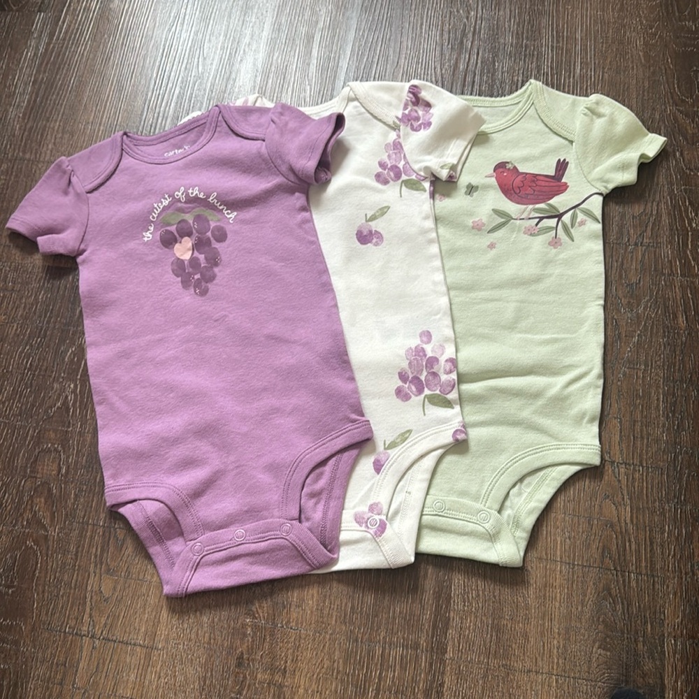 Carter’s baby girl onesie 3-pack set. NWOT